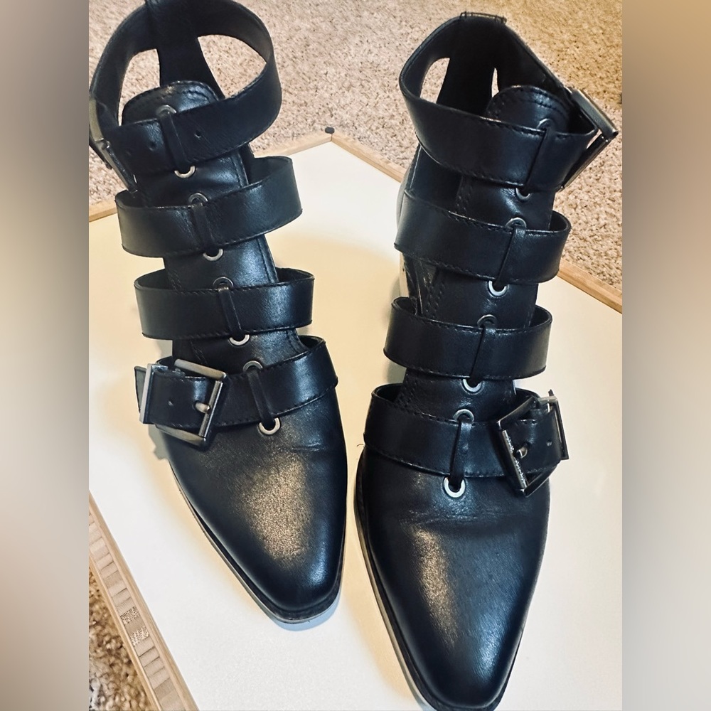 Michael Kors black leather griffin cutout bootie with block heel. Size 8.5